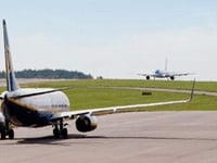 Two men charged after causing disruption at Bristol Airport