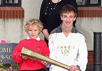 Olympic torch-bearer makes school's day