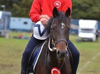 Rory rides to glory