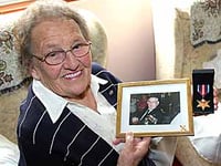 Liz’s pride over husband’s medal