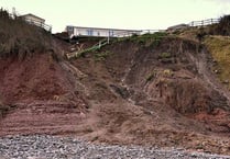 Couple move back to their cliff-edge home
