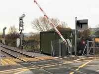 Storm wrecks new rail crossing