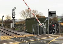 Storm wrecks new rail crossing