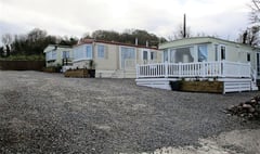 Councillor challenged on caravan site plans