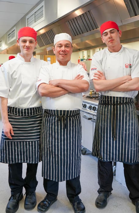 Chef Werner Hartholt and young chefs