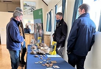 Eric Parker of Eastbury Farm, looks at finds found on his land