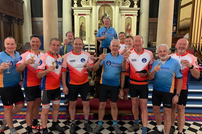 Mason cyclists who raised £10,000