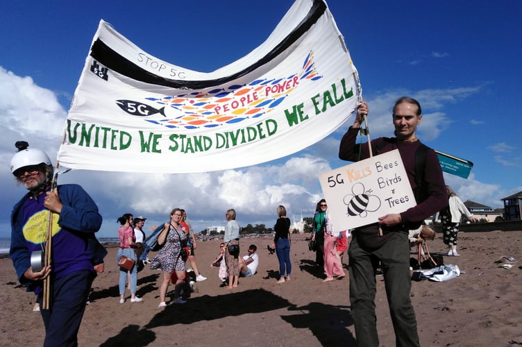 Anti-5G campaigners on the beach at Minehead