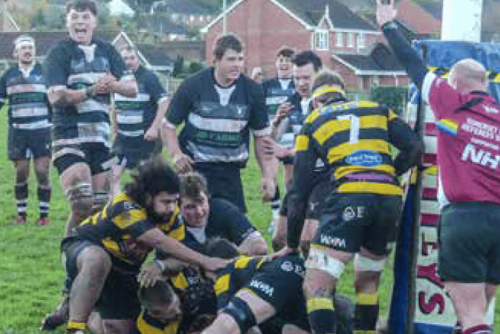 James Cox scores a try for Minehead Barbarians