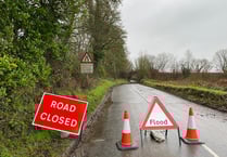 A39 closed at Williton after car ends up in ditch