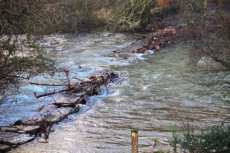 The middle section of Tarr Steps has been washed away