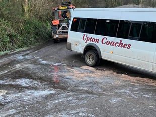 School bus collides with hedge in icy conditions 