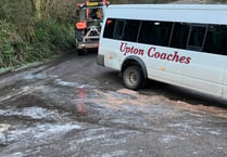 School bus collides with hedge in icy conditions 