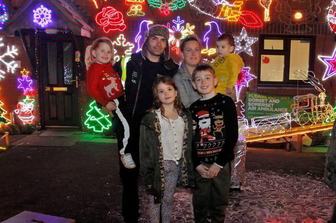Mr Grace with his wife Beverley  and four children