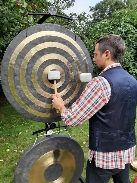 Reuben Coté banging his gongs