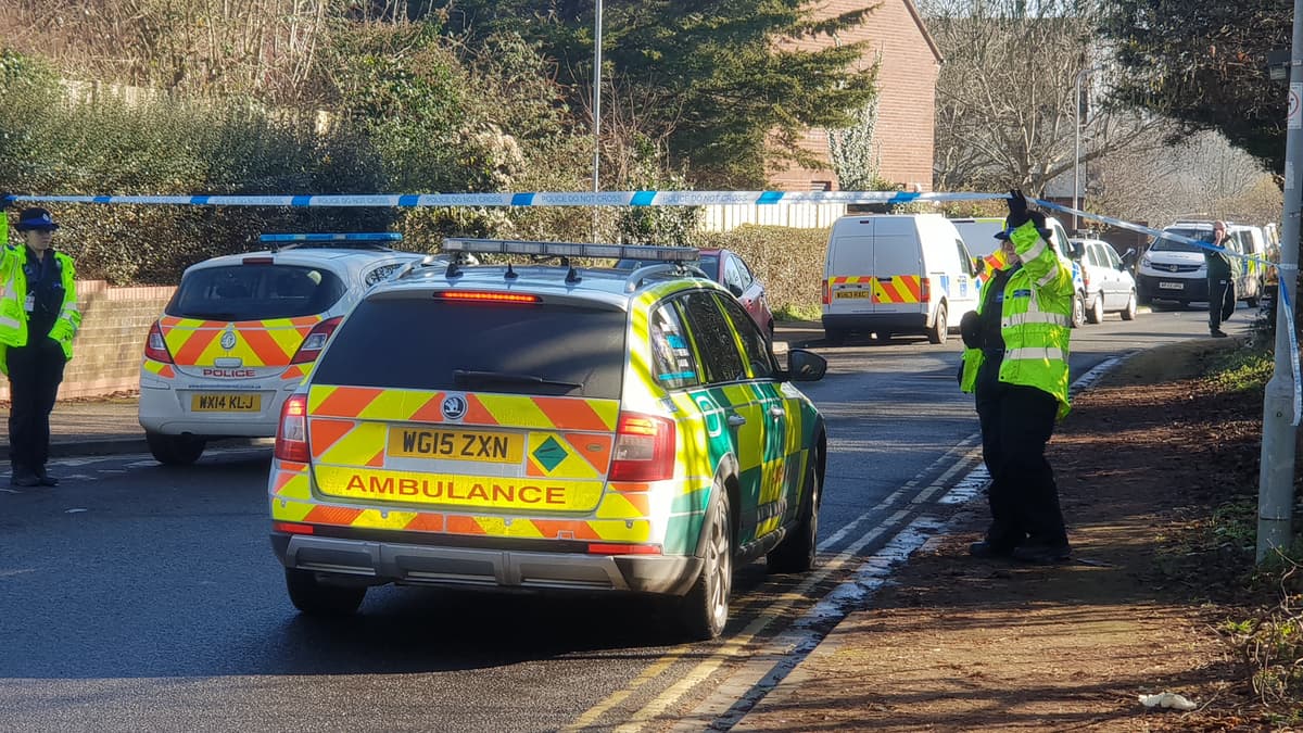 Man and woman in custody after police launch murder inquiry in ...