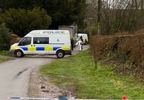 Police cordon off village and arrest man on suspicion of murder