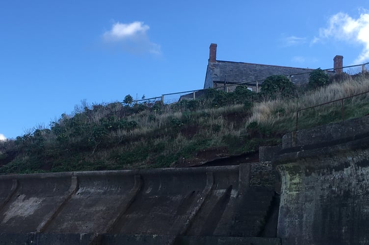 The Blue Anchor pub seen from the beach below 