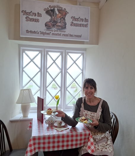 Jessica Chipperfield with a choice of cream tea, jam first or cream first.