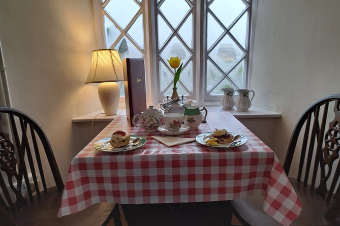 Depending where you sit in The Rambler's Rest tea room on Exmoor you can have your cream tea served either way, jam first or cream first
