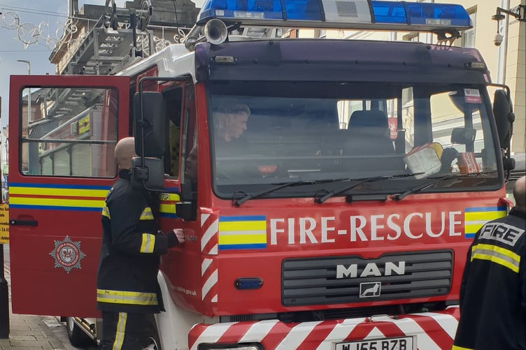 More than 20 fire crews are battling an overnight blaze in Porlock Weir.