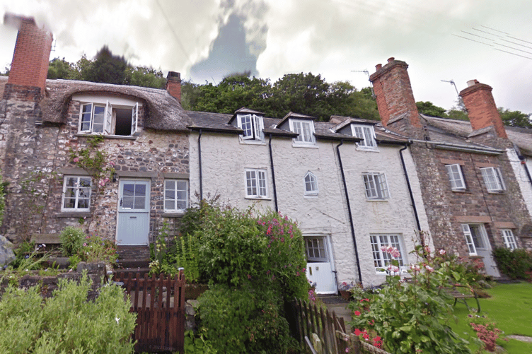 How the terrace of houses in Porlock Weir looked before the fire.