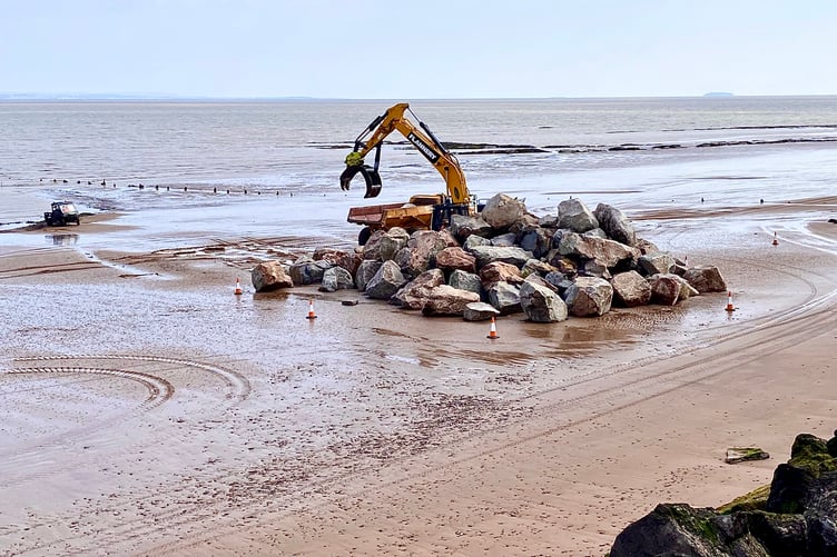 Blue Anchor rock armour being moved on the beach as work started this week.