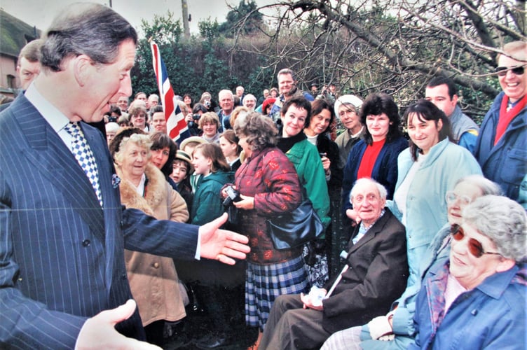 The then Prince of Wales chats to well-wishers at Old Cleeve