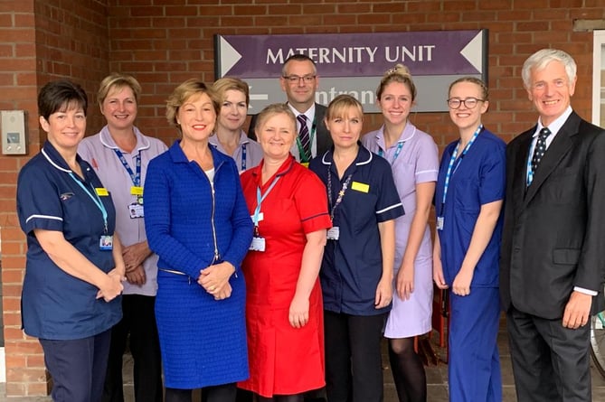 MP Rebecca Pow (third, left) with leaders and staff in Musgrove Park Hospital, Taunton.