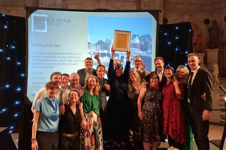 Onion Collective members celebrate winning three architectural awards for the East Quay, Watchet.