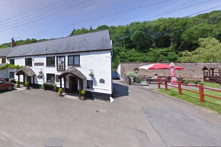 The Valiant Soldier, Roadwater, with woodland behind where thousands of trees are due to be felled.