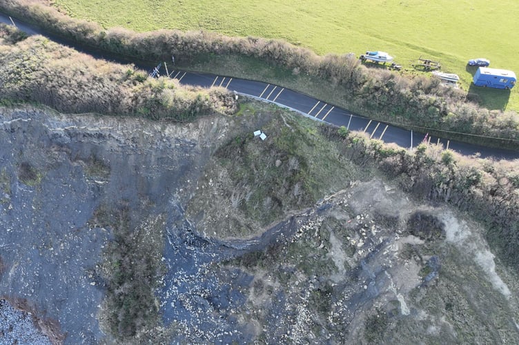 Aerial view of cliff erosion alongside B3191 at Cleeve Hill, Watchet.