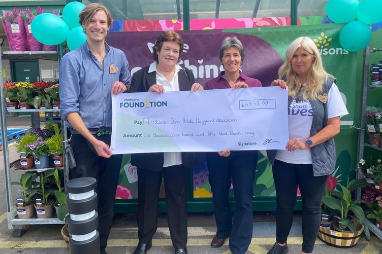 At the cheque presentation were (left to right) Morrisons Minehead duty manager Adam Rawle-Ashby, play area trustees chairman Kathy Walker, Timberscombe parish clerk Lesley Webb, and Morrisons community champion Sharon Mainwaring.