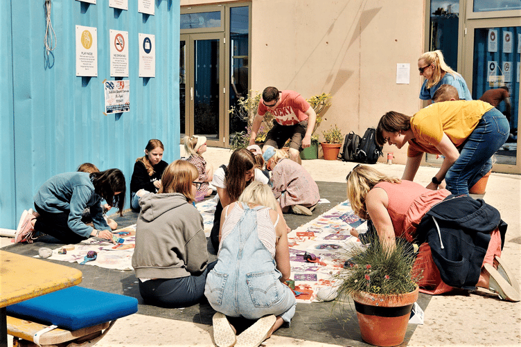 Summer holiday fun on the East Quay, Watchet.