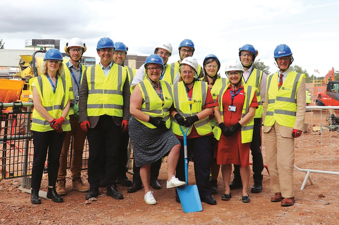 Breaking the ground at the start of building work for Musgrove Park Hospital's new surgical unit.