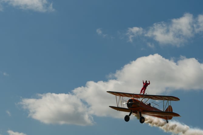 Hinkley Point B station director Mike Davies doing a wing walk on a Boeing Stearman biplane to raise money for a cancer charity.