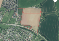 Village housing plan scaled back