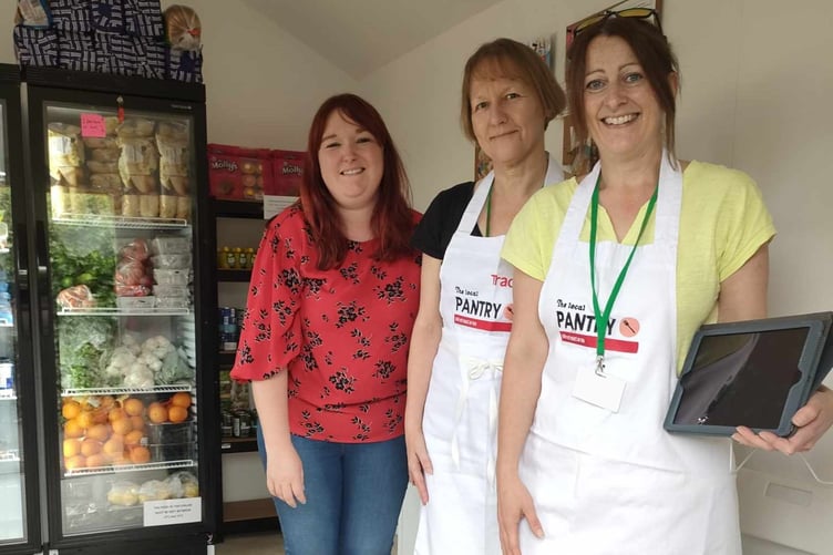West Somerset Food Cupboard volunteers receive an iPad from Spark iT.