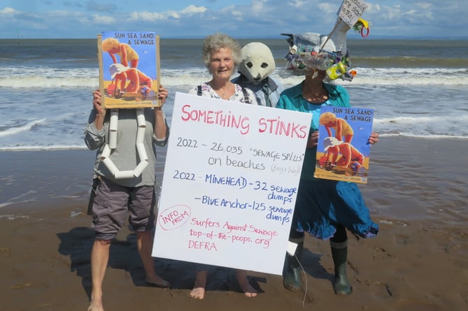 A Women's Institute and Extinction Rebellion protest on Minehead beach against raw sewage dumping.