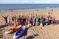 Beach to pub mass swim for 60th birthday