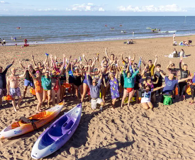 Beach to pub mass swim for 60th birthday