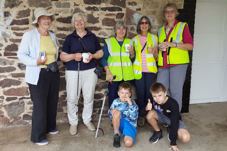 Some of the Carhampton litter pick helpers enjoying a cup of tea after their efforts.