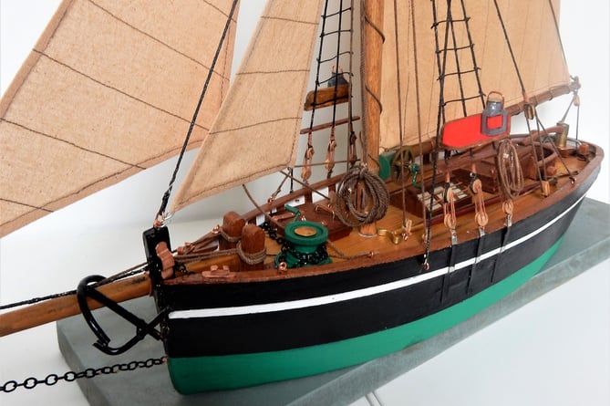 A Tony James sailing vessel model.