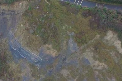 An aerial view of the cliff collapse alongside the B3191 road Watchet Blue Anchor Carhampton