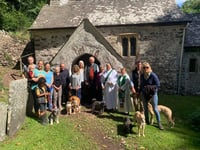 Ancient church attracts dog walkers for service