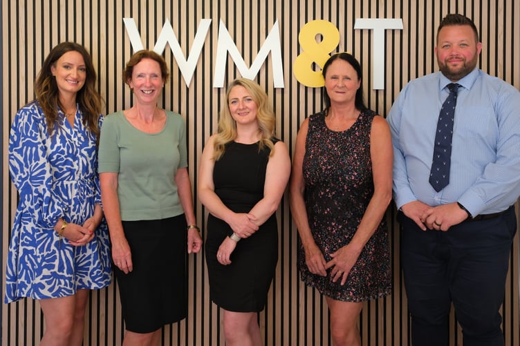The successful Wilkie May and Tuckwood Minehead office gold award winner office manager Richard Parsons is pictured (right) with the Minehead team (left to right) Kayleigh Green, Victoria Alford, Abigail Moloney, and Faye Symes.