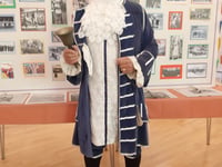 Village crier sought with loud voice who likes dressing up