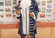Village crier sought with loud voice who likes dressing up