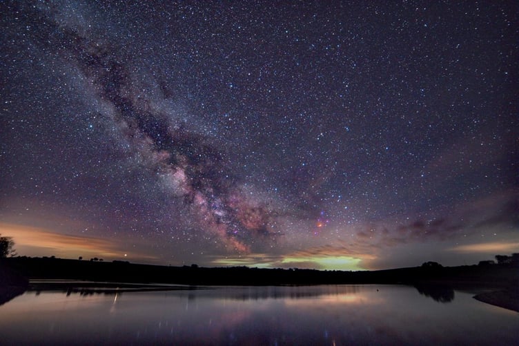 The night sky over Wimbleball Lake, on Exmoor.