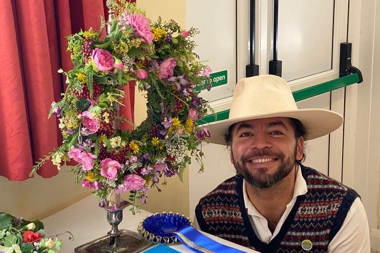 Marcelo Alvarenga with his 'Best in Show' exhibit at Withypool Flower Show and Fete.